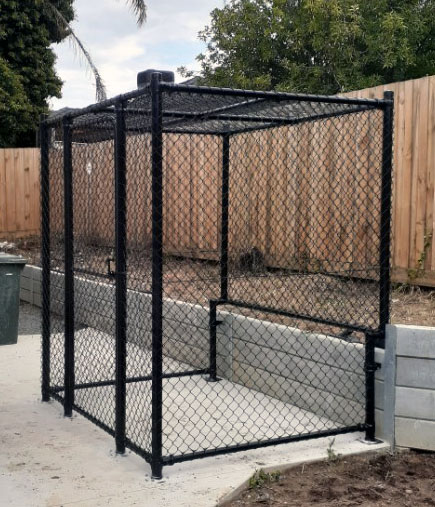 Black bin enclosure installed by guardian fencing