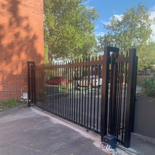 Gate beside building Gate beside building
