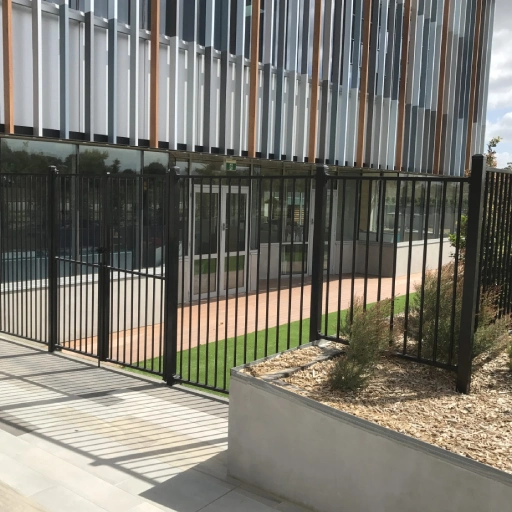 Tubular fence by the office Tubular fence by the office